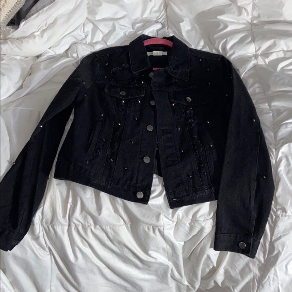 Distressed jean jacket